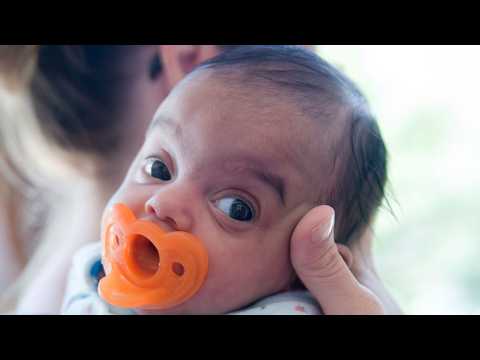 Thumbnail for Family adopts baby given 2 days to live “She was everything beautiful with the world”